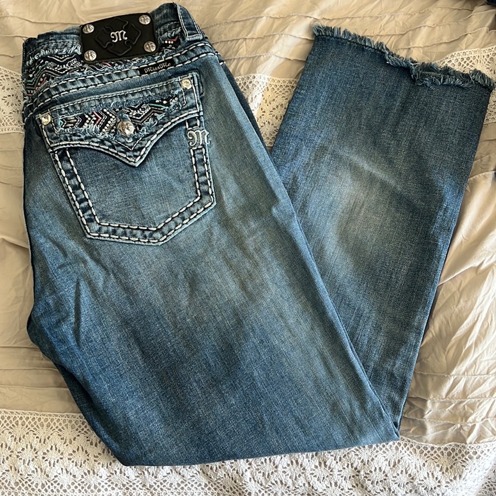 Miss Me cropped mid-rise jeans.